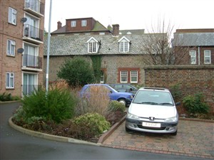Photo:Side wall of Meeching Hall, Meeching Court Flats at left
