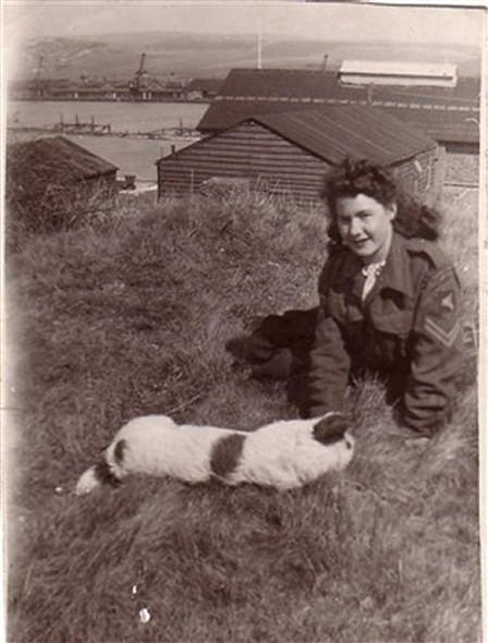 Photo:Freda Osborn with the Drill hall in the background