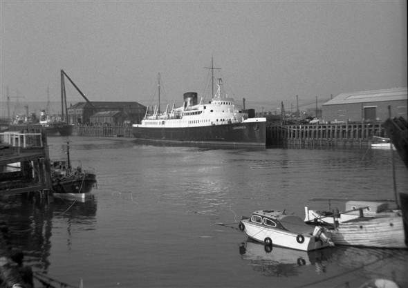 Photo:Londres at the Railway Quay in the Autumn of 1963. Withdrawn from service at the end of the season, she awaits sale to Greek owners at the end of the year. The dredger AA Raymond is undergoing conversion up at the Marine Workshops, and I wonder what our lifeboat Kathleen Mary is doing so far upriver.