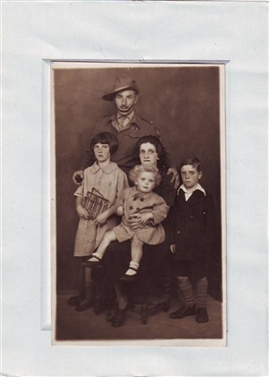 Photo:George Mitchell with his wife (who was known as Fuzz) and their three children.