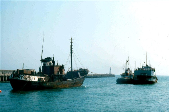 Photo:An old ex Lossiemouth trawler under tow to the breakers