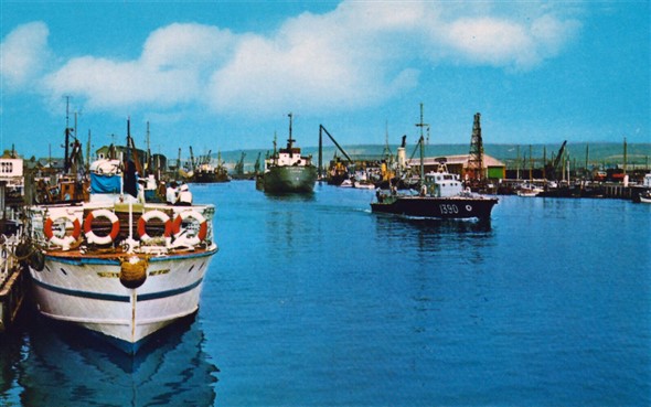 Photo:Busy harbour scene