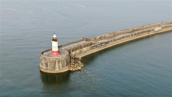 Photo:The Breakwater end and lighthouse.