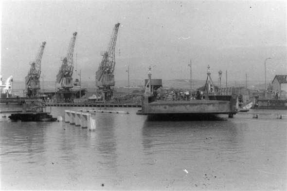 Photo:The North Quay with three of the three ton cranes. Also the swing bridge team can be seen turning the capstan to open and close the bridge