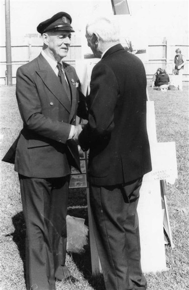 Photo:My father Bob welcomes Sir Alec to the Newhaven & Seaford Historical Society stand.