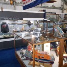 Photo:Lifeboat display and part of the main display cabinet